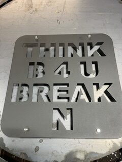 Custom metal “THINK B4 U BREAK” sign made with CNC plasma cutting